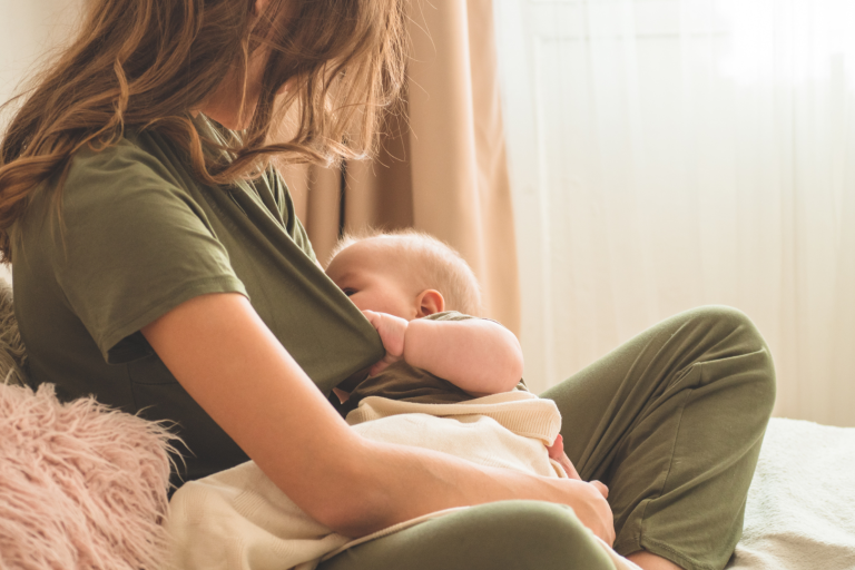 Mum breast feeding baby