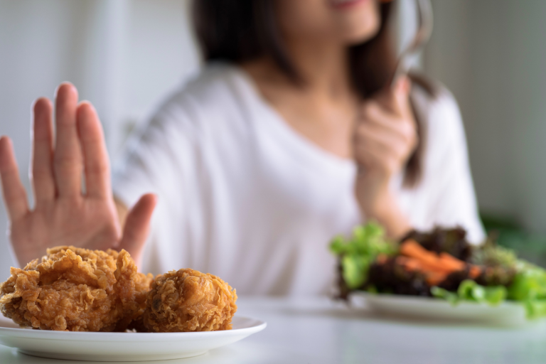 Hand rejecting fried food