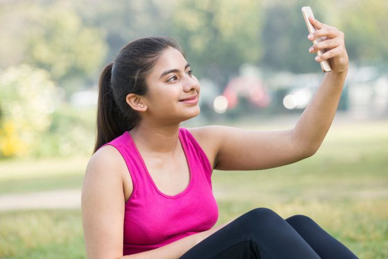 Teenage looking at phone