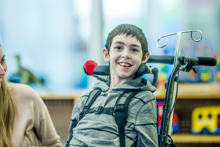 Teenage boy in wheelchair with wording SEND