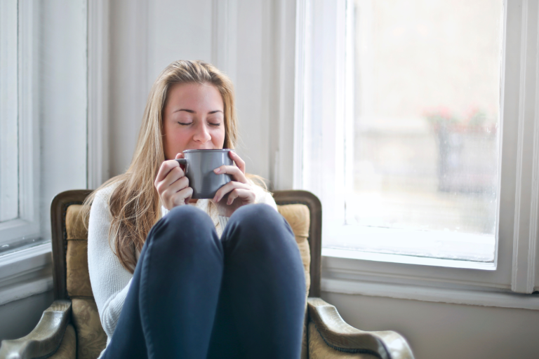 Lady sitting drink coffee