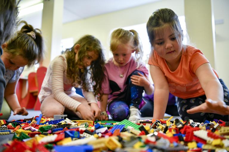 Children playing with lego