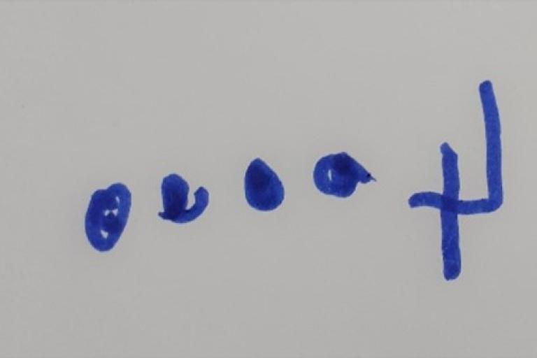 Drawing of four circles and a mirror image of the number 4