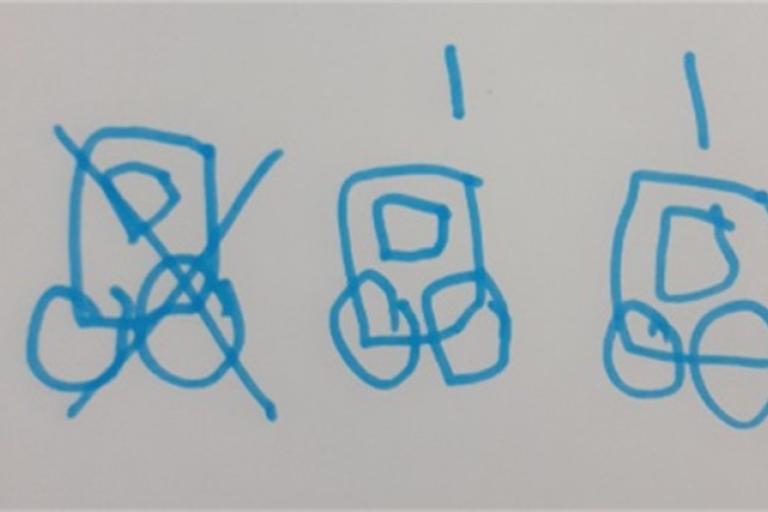 Drawing of three cars with one car crossed out to show subtraction