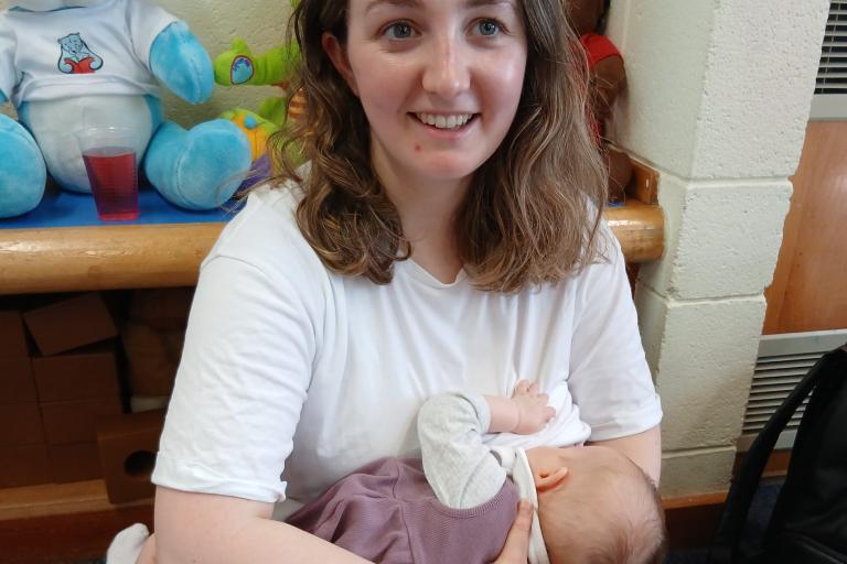 Mother breastfeeding her child
