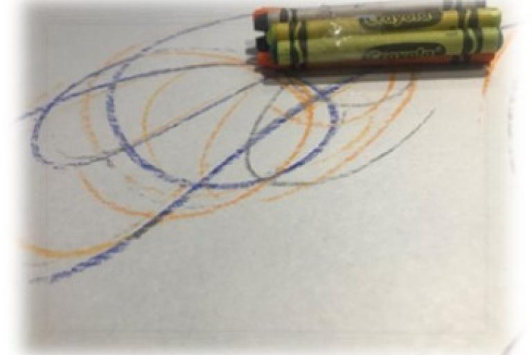 Patterns made on a paper with crayons