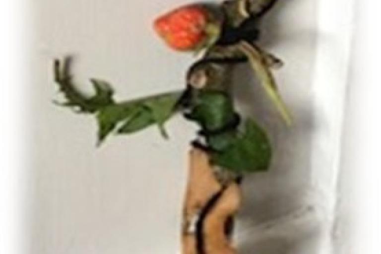 Stick with attached pieces to create a character