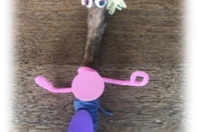 Stick designed as a person using arts and crafts
