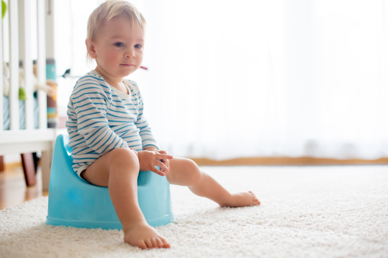 Child sat on a potty