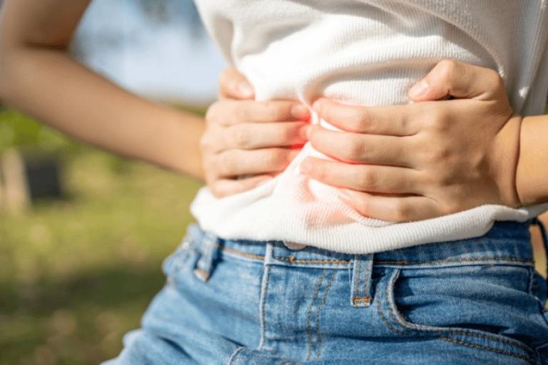 Child pressing on their stomach