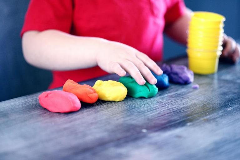 Child playing with playdough