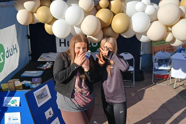 Hub2U stall set up with balloons