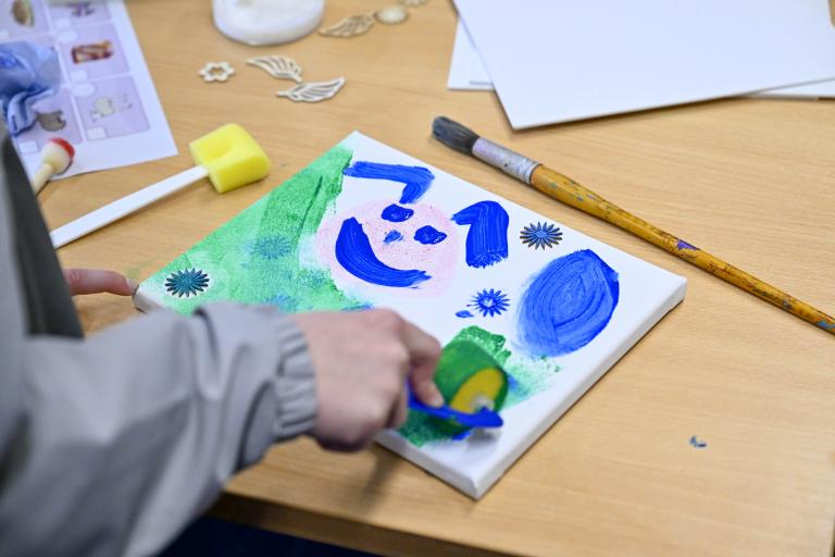 Child painting a picture