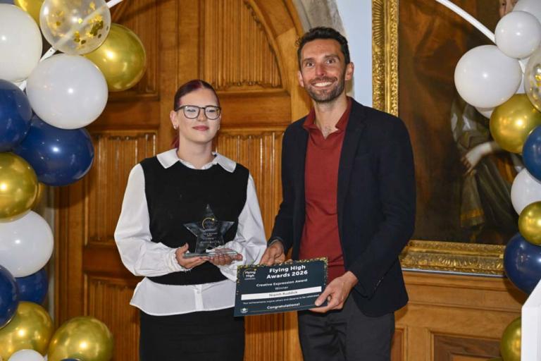Niamh receives award from Josh MacAlister MP