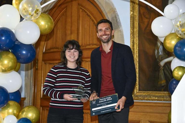 Faith receives award from Josh MacAlister MP