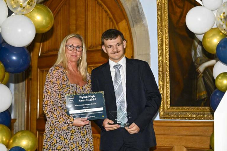 Joseph receiving award