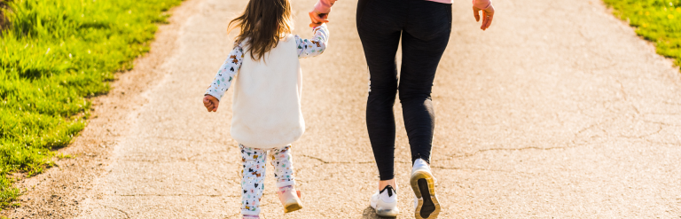 Toddler and mum walking