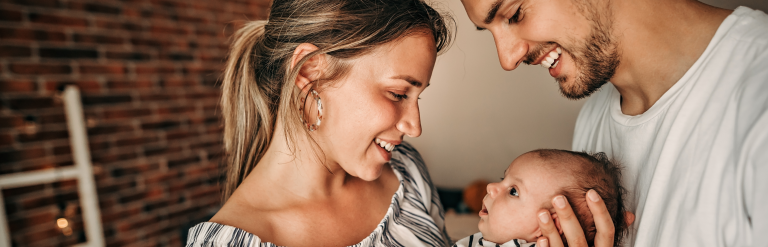 Parents holding their baby